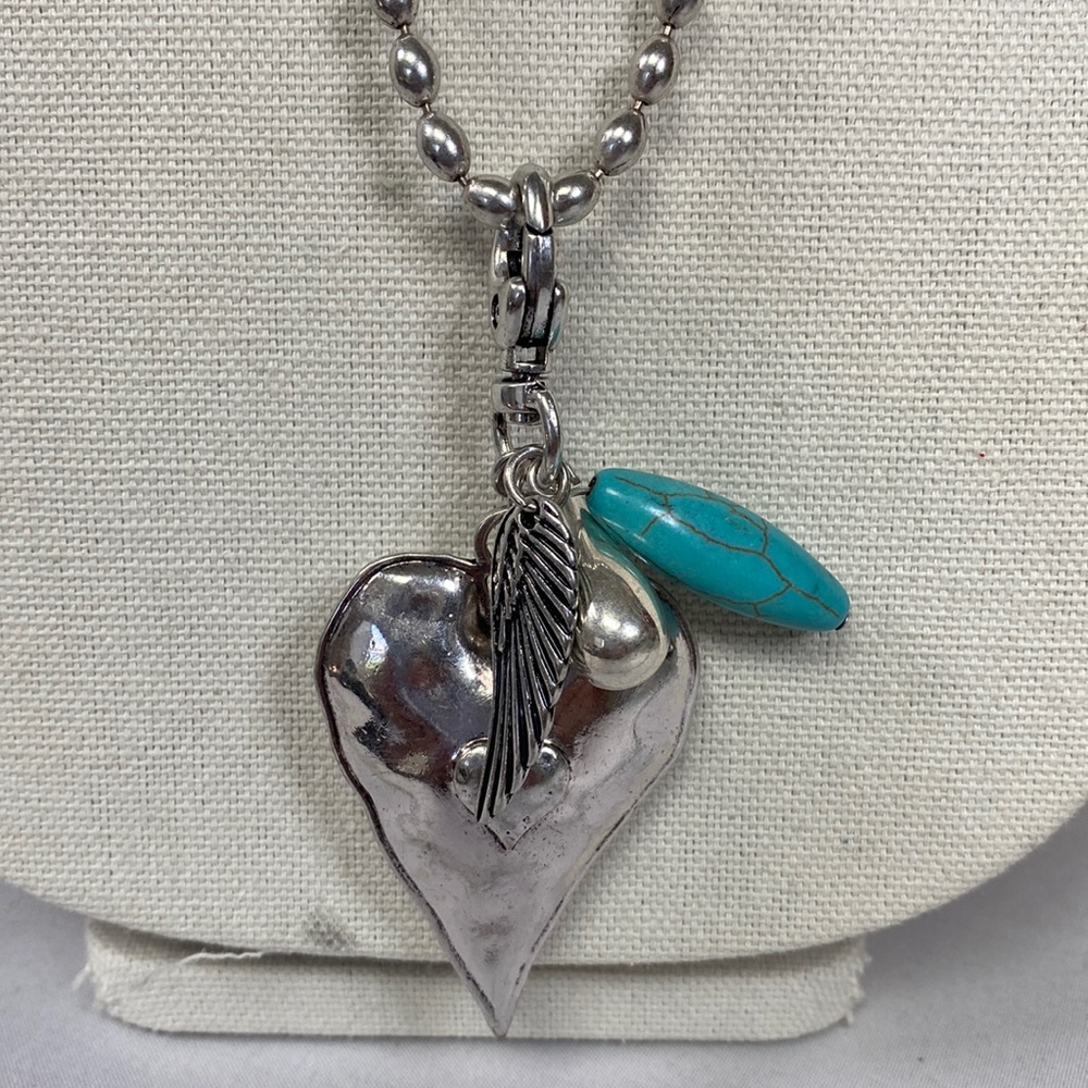 Long silvertone Sweet Lola heart and wings necklace